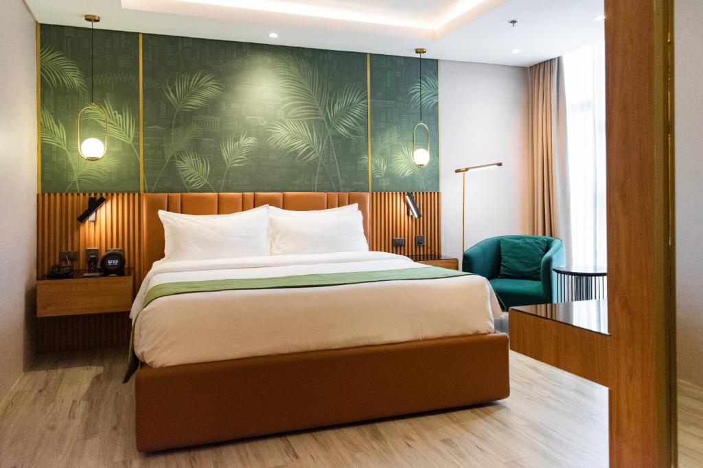 Voodi või voodid majutusasutuse Ironwood Hotel toas