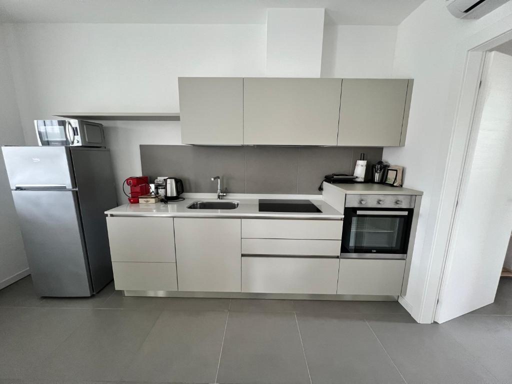 Kuchyňa alebo kuchynka v ubytovaní Val Mora Bio Apartments