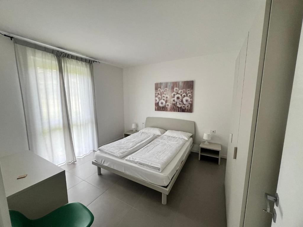 Posteľ alebo postele v izbe v ubytovaní Val Mora Bio Apartments