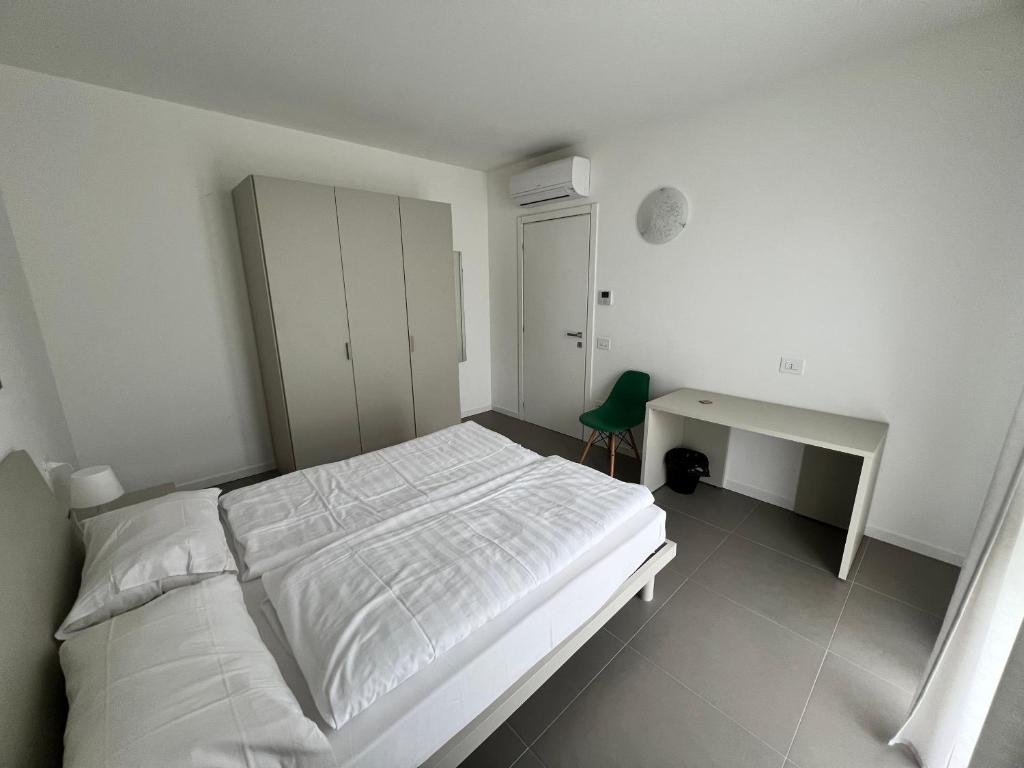 Posteľ alebo postele v izbe v ubytovaní Val Mora Bio Apartments