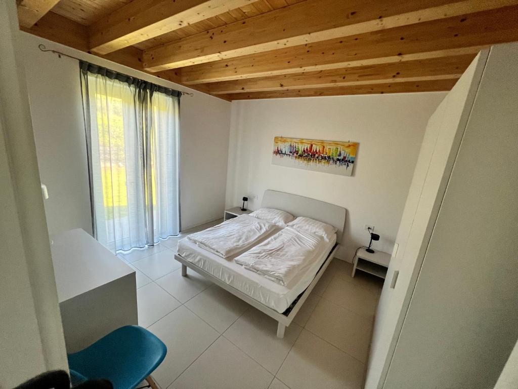 Posteľ alebo postele v izbe v ubytovaní Val Mora Bio Apartments