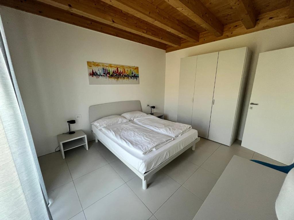 Posteľ alebo postele v izbe v ubytovaní Val Mora Bio Apartments