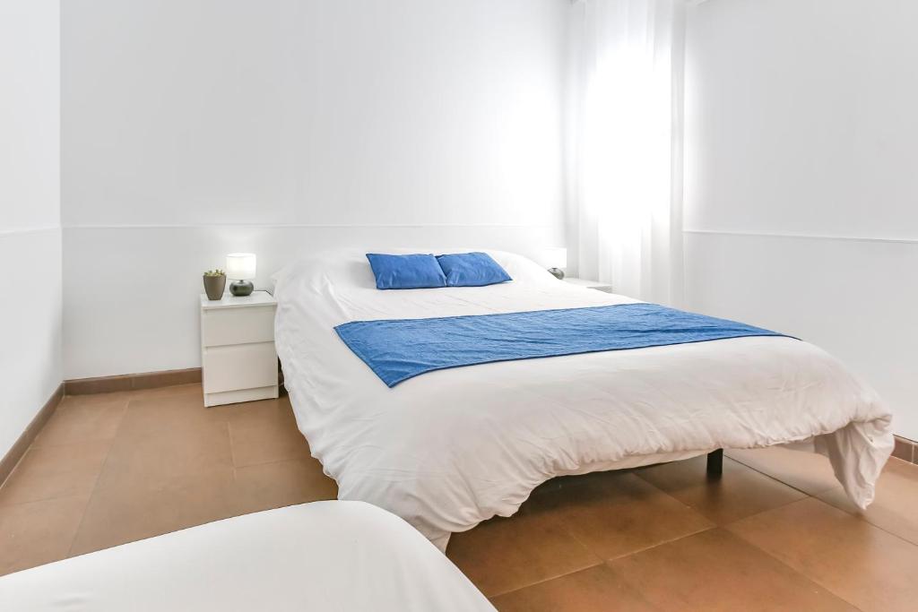 Postel nebo postele na pokoji v ubytování Laramond Barcelona Rooms