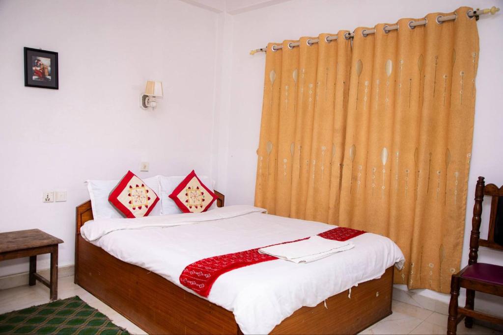 Postel nebo postele na pokoji v ubytování Hotel Misty Nepal