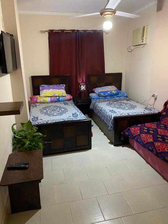 A bed or beds in a room at Chalet in Belagio Ain Sokhna