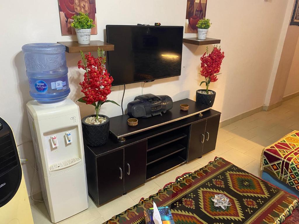 A television and/or entertainment centre at Chalet in Belagio Ain Sokhna