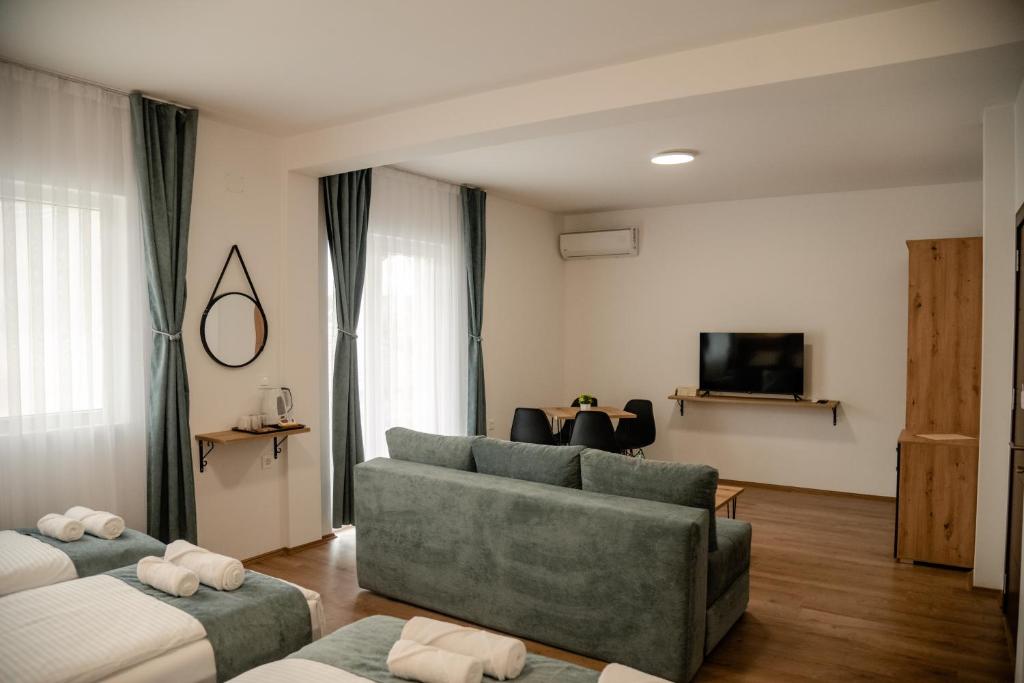 TV a/nebo společenská místnost v ubytování Villa Petra