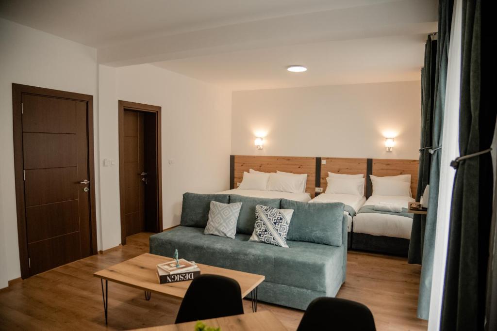 Postel nebo postele na pokoji v ubytování Villa Petra