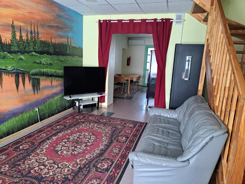 TV a/nebo společenská místnost v ubytování Kagu Hostel