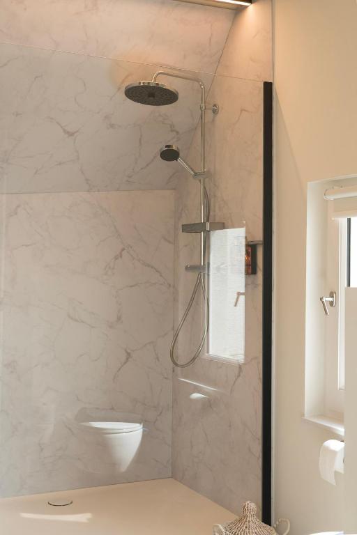 Koupelna v ubytování NOX Logies, vakantiewoning en polyvalente ruimte