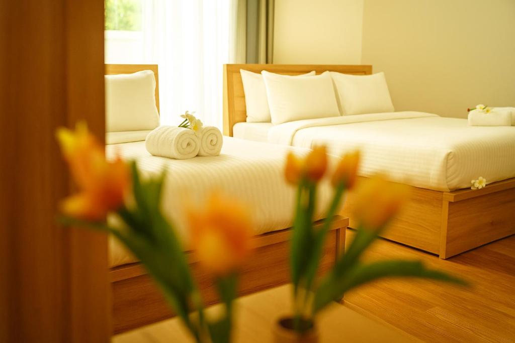 Postel nebo postele na pokoji v ubytování Cozy Vacation Home