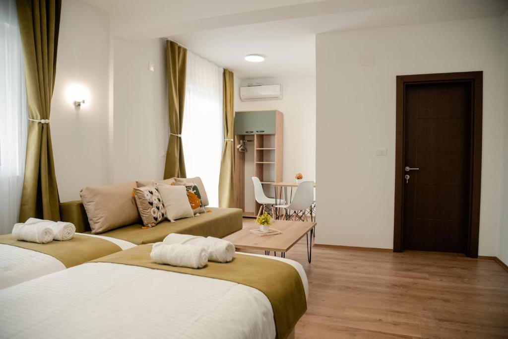 Postel nebo postele na pokoji v ubytování Villa Petra