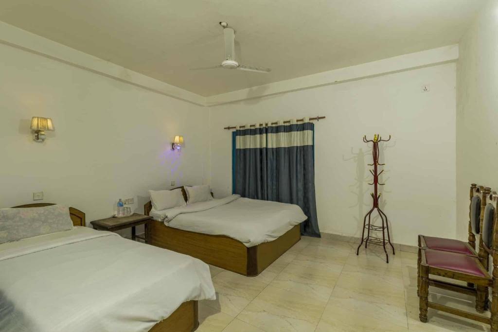Postel nebo postele na pokoji v ubytování Hotel Misty Nepal