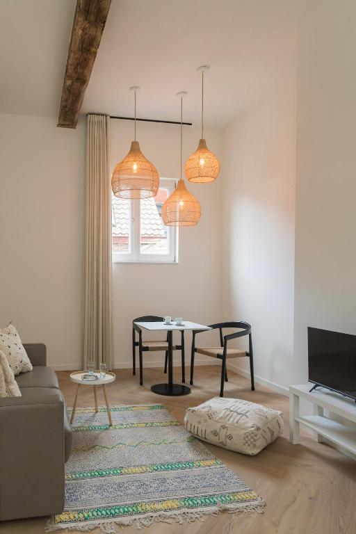Posezení v ubytování NOX Logies, vakantiewoning en polyvalente ruimte