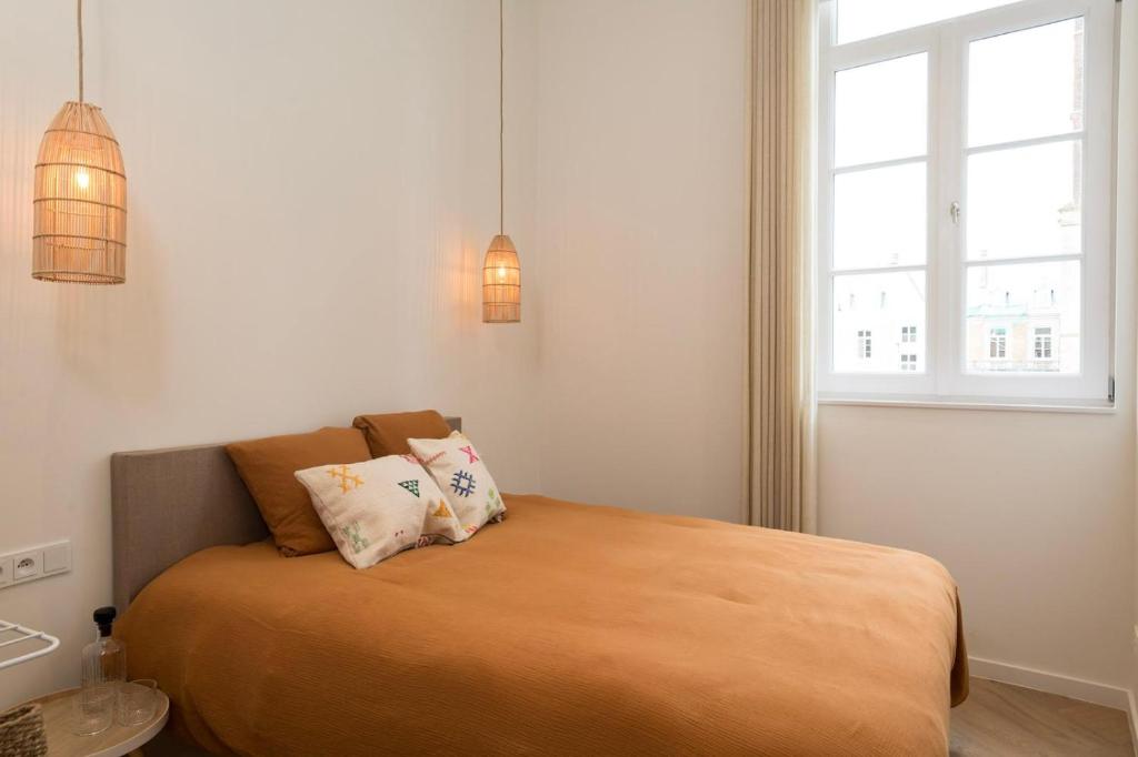 Postel nebo postele na pokoji v ubytování NOX Logies, vakantiewoning en polyvalente ruimte