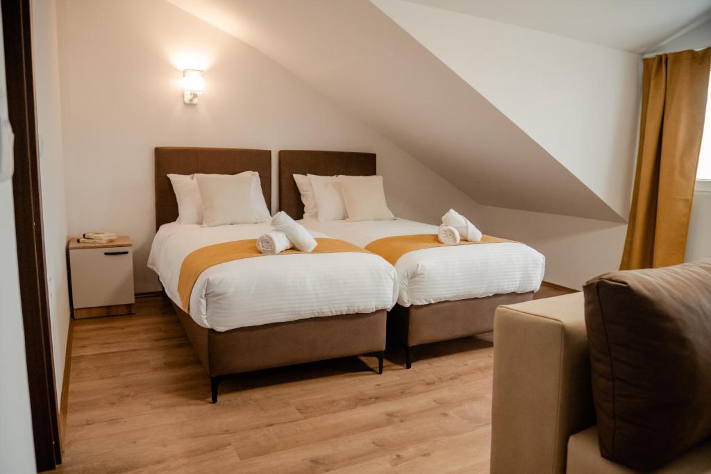 Postel nebo postele na pokoji v ubytování Villa Petra