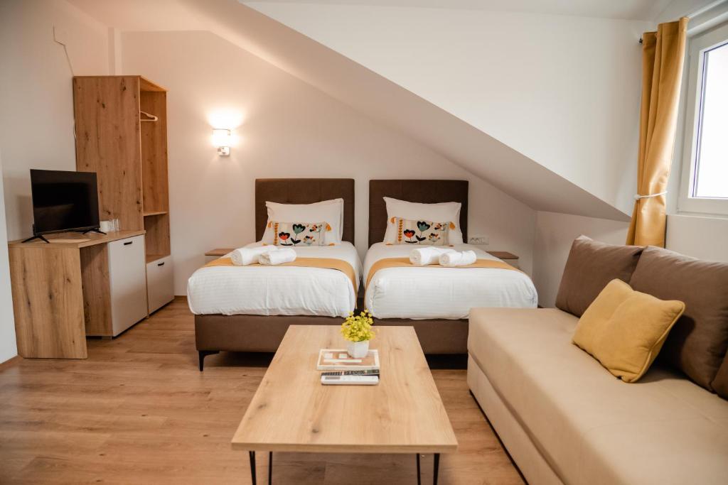 Postel nebo postele na pokoji v ubytování Villa Petra