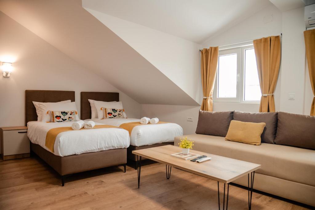 Postel nebo postele na pokoji v ubytování Villa Petra