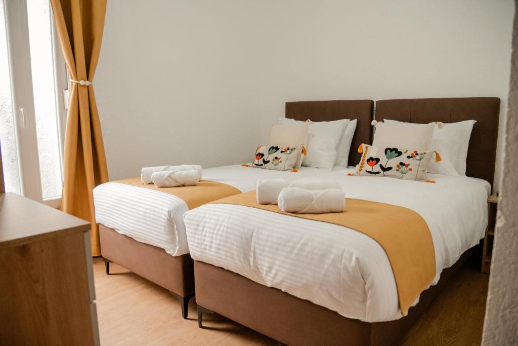 Postel nebo postele na pokoji v ubytování Villa Petra