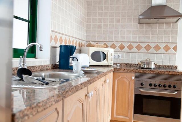 Kuchyň nebo kuchyňský kout v ubytování Villas Costa Papagayo