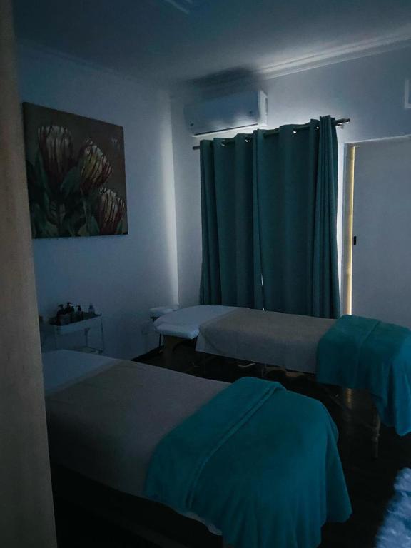 Letto o letti in una camera di Omaha Luxury B&B & SPA