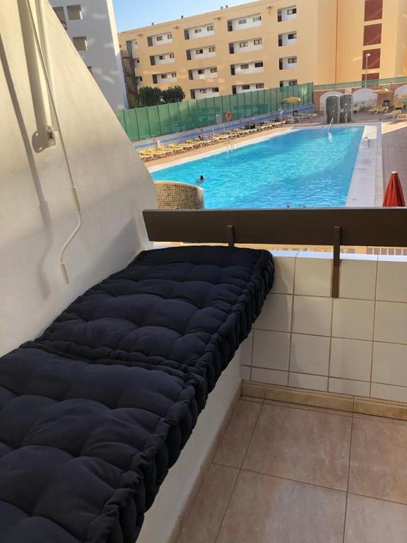 Bazén v ubytování Yumbo Beach Apartment Perfect location free fast WIFI nebo v jeho okolí