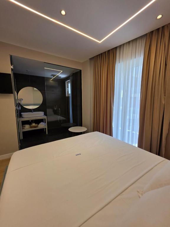 Postel nebo postele na pokoji v ubytování Orik Hotel & Spa