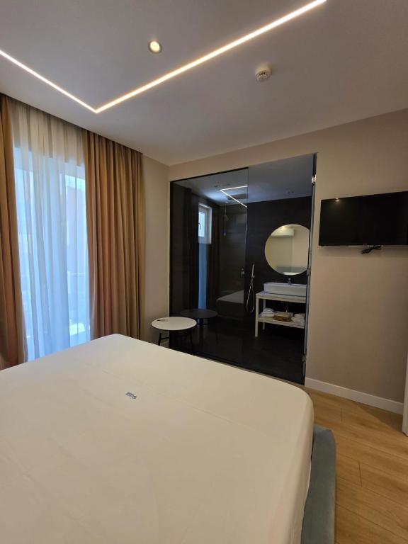 Postel nebo postele na pokoji v ubytování Orik Hotel & Spa