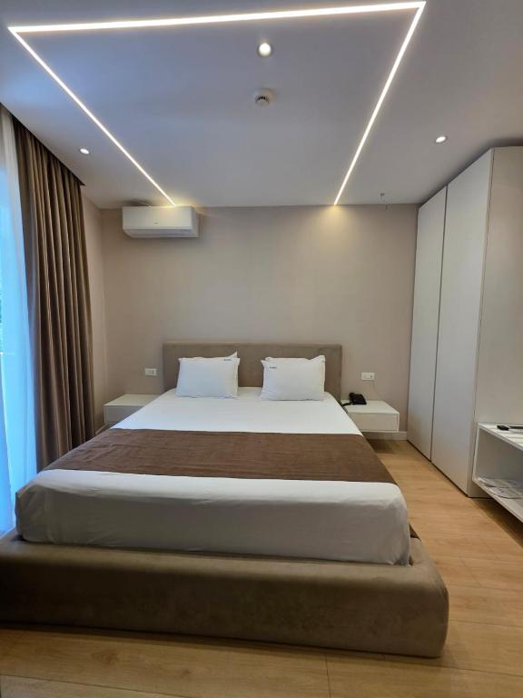 Postel nebo postele na pokoji v ubytování Orik Hotel & Spa