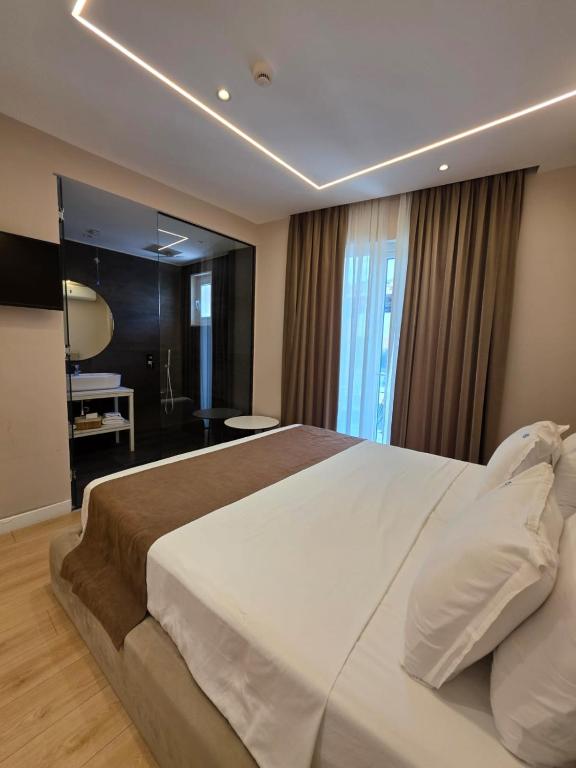 Postel nebo postele na pokoji v ubytování Orik Hotel & Spa