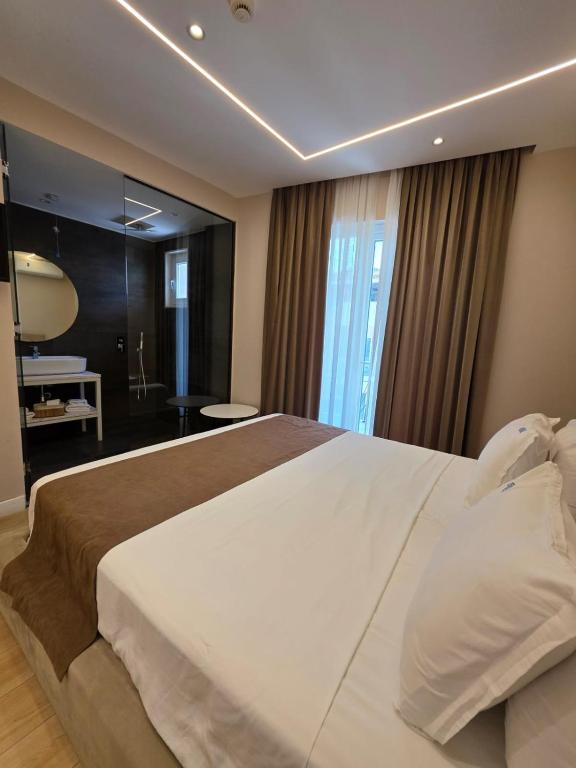 Postel nebo postele na pokoji v ubytování Orik Hotel & Spa