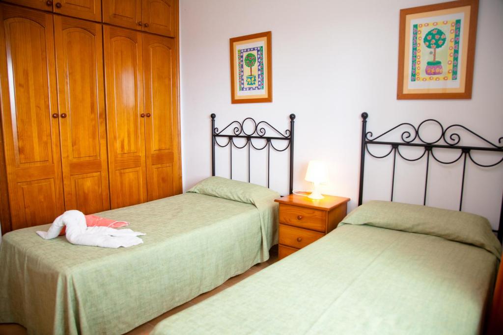 Postel nebo postele na pokoji v ubytování Villas Costa Papagayo