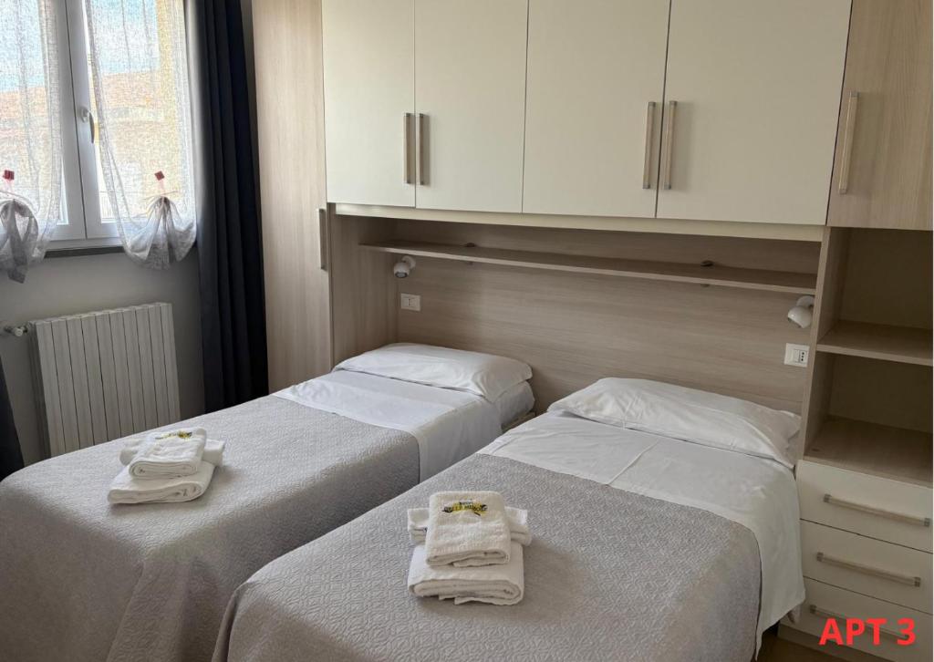 A bed or beds in a room at Agnese Apartments