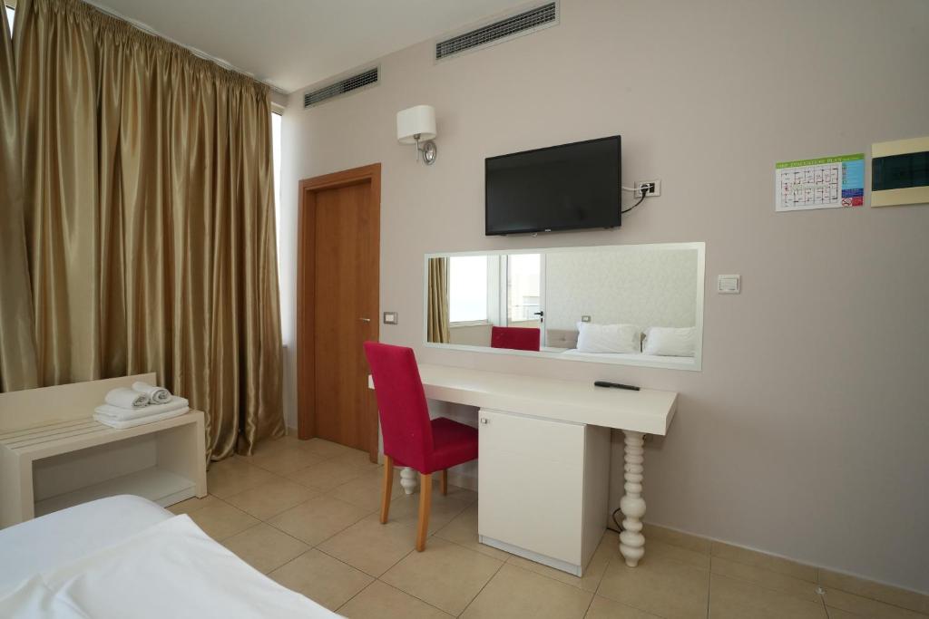TV a/nebo společenská místnost v ubytování Sun Hotel