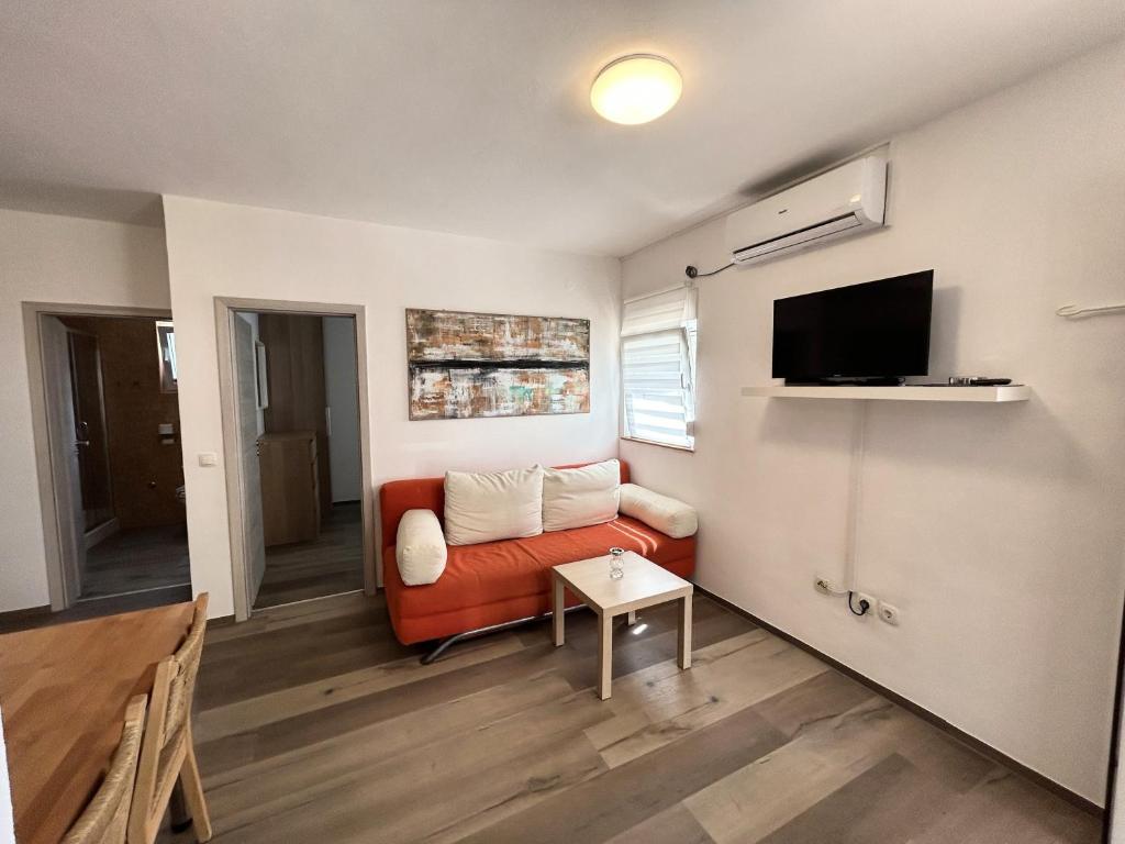 Telewizja i/lub zestaw kina domowego w obiekcie Apartment House Virić