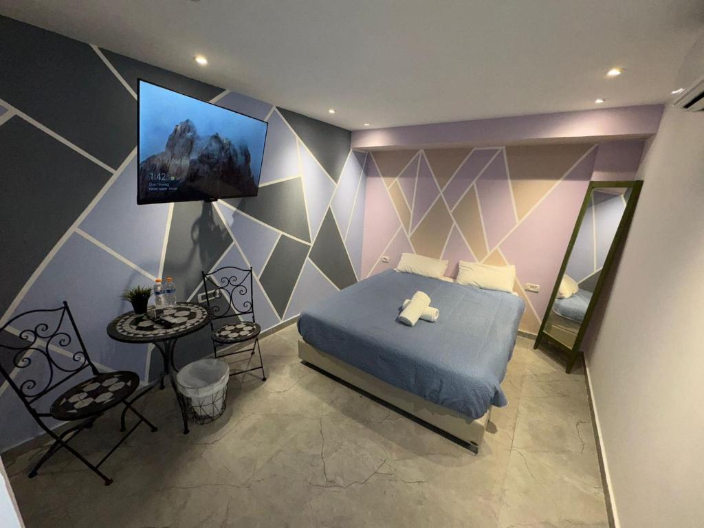 Postel nebo postele na pokoji v ubytování Lago Suites Hotel