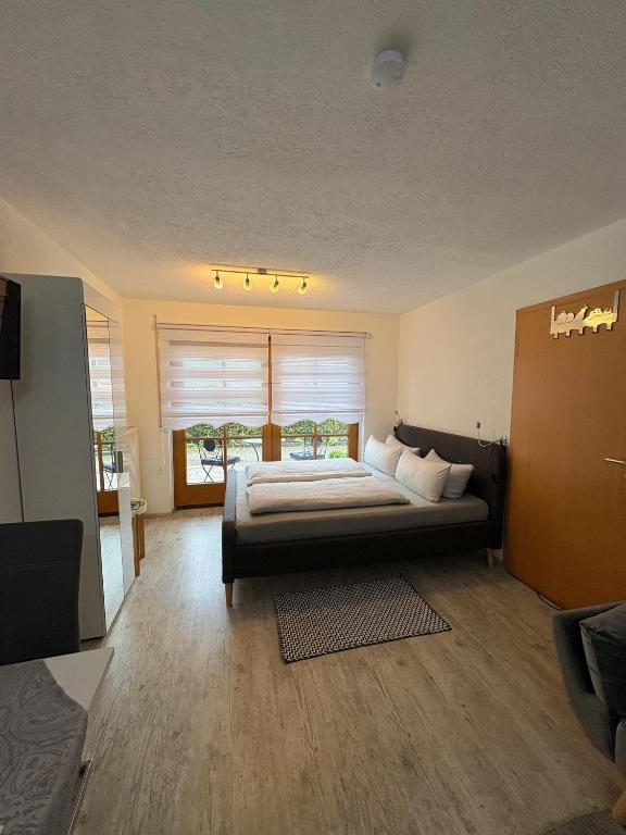 Postel nebo postele na pokoji v ubytování Ferienwohnung Emil