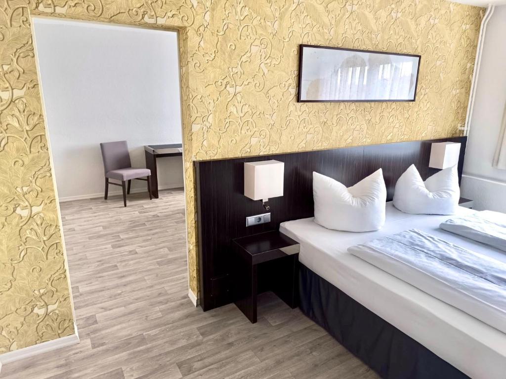 Postel nebo postele na pokoji v ubytování Hotel 22