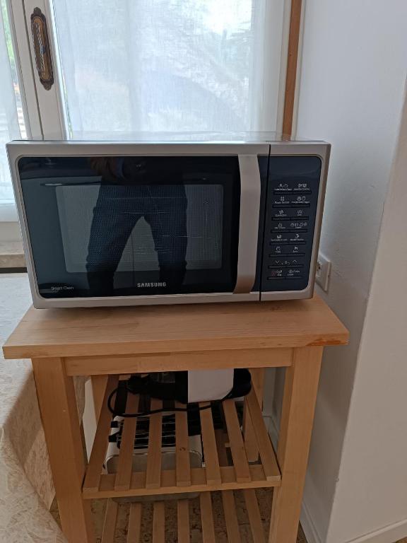 TV a/nebo společenská místnost v ubytování Studio Zu - Lakeside Apartment