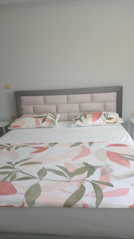 Postel nebo postele na pokoji v ubytování Ida Apartments