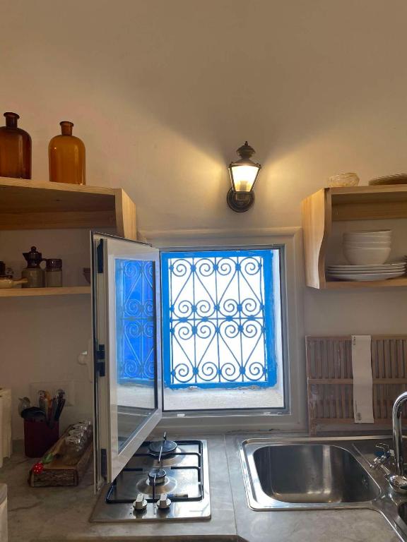 Kuchyň nebo kuchyňský kout v ubytování artgohomes