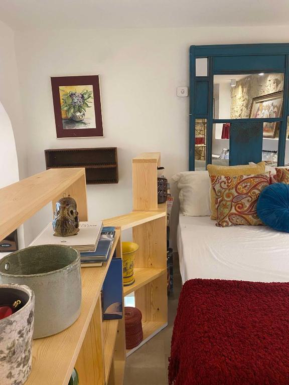 Postel nebo postele na pokoji v ubytování artgohomes