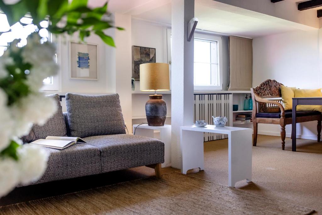 En eller flere senge i et værelse på Wohnung im Grünen cottage33