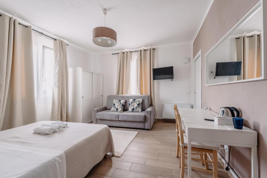 TV a/nebo společenská místnost v ubytování Franciacorta Rooms 1
