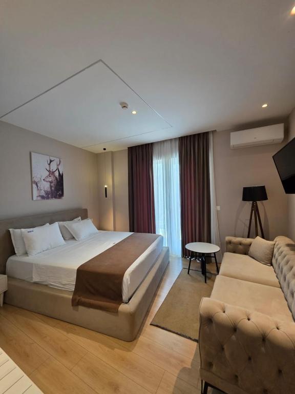 Postel nebo postele na pokoji v ubytování Orik Hotel & Spa