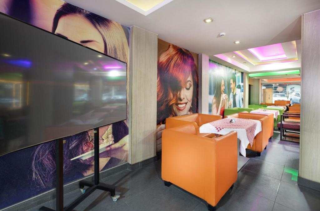 TV a/nebo společenská místnost v ubytování Kanzy Hotel Cairo