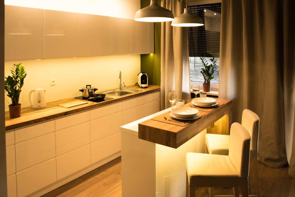 Posedenie v ubytovaní Uniejów Apartments