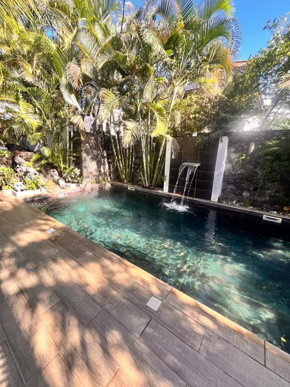 Bazén v ubytování Oasis Tropicale nebo v jeho okolí