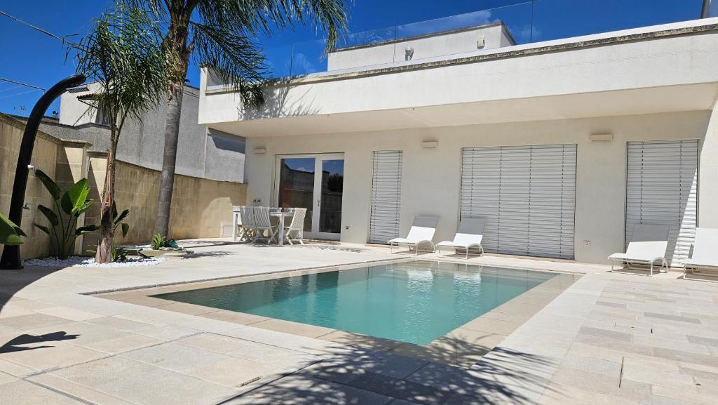 Kolam renang di atau dekat dengan Masseria "Casa Giulia" con piscina