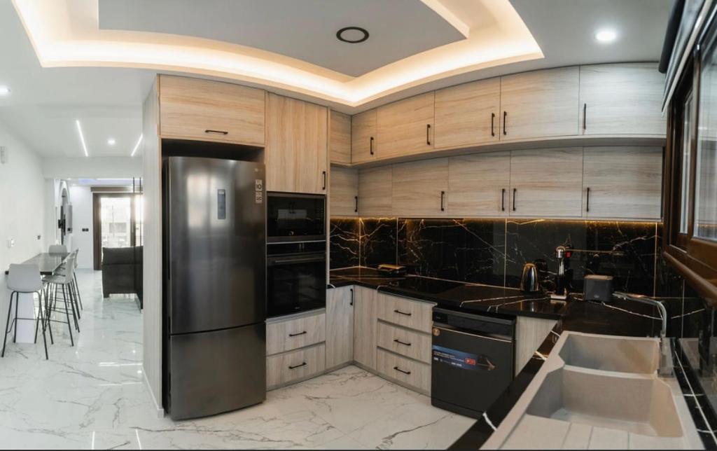Kuchyň nebo kuchyňský kout v ubytování Sea view maisonette Chloraka